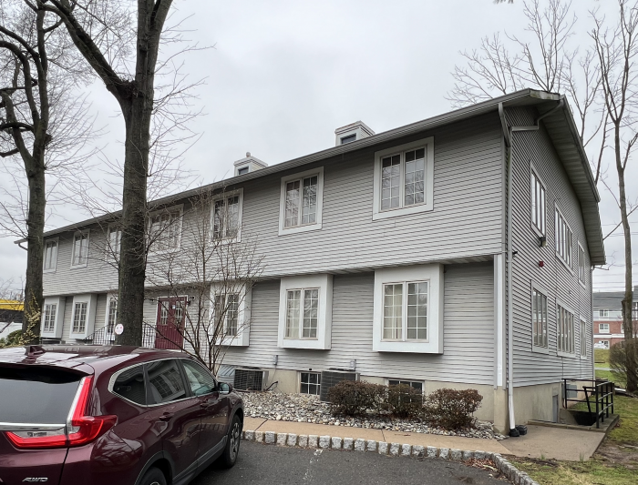 The two-story, cream-colored building that houses New Jersey Registered Agent LLC in Branchburg, NJ.